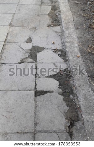 Restricted local government budgets are reflected in potholes and damaged roads