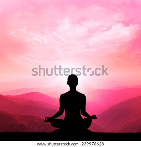 Yoga silhouette in the mountain