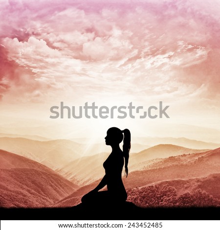 Yoga and meditation. Silhouette girl.