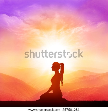 Yoga and meditation. Woman silhouette.