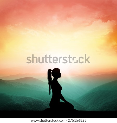 Yoga and meditation. Silhouette of woman.