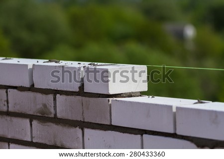 Build a wall brick by level