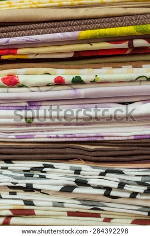 Background of folded cloth on the sewing factory.