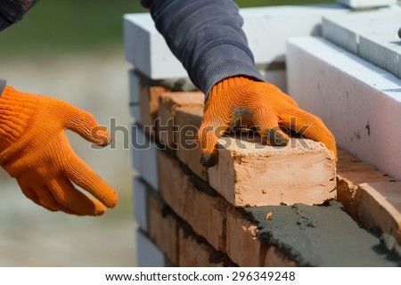 builder builds a wall