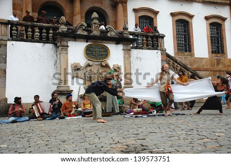 OURO PRETO, BRAZIL- MARCH 18 2012 :Members of  The Rainbow Family of Living Light  loosely affiliated group during a street exhibition in Ouro Preto, Minas Gerais ,Brazil    on 18 March 2012 .