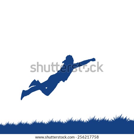Silhouette of a man jumping over the grass