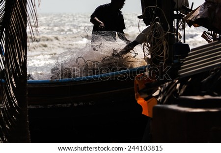 Fisherman nets of are stored on boat