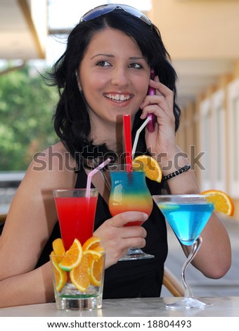 Girl with several decorated cocktail  beautiful full color