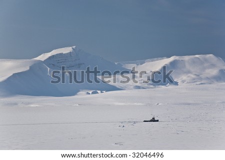 Amazing frost Sea landscape with Ship of Spitsbergen in the Arctic North Pole region.