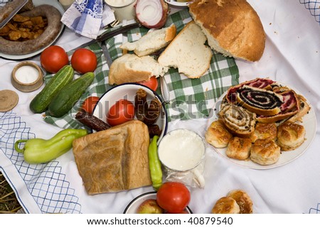 Serving domestic natural food. Bacon, , Bread on the old traditional Sheet. Tradition Hungary,Serbian and Croatian kitchen. Healthy Foods.
