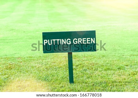 Sign / Plate on a golf field, contents \'Putting green\' (can be deleted, so you have a blank sign for your needs)