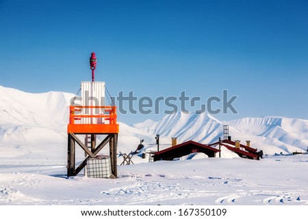 Amazing frost Sea landscape with Lighthouse of Spitsbergen in the Arctic North Pole region