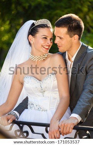 Just married couple sharing emotion outdoors