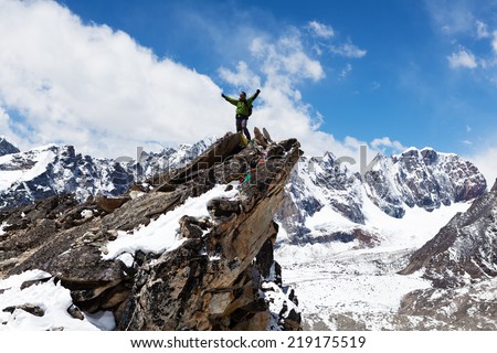 Mountaineer at the top of the world, Himalayas, Mount Everest. Copy space
