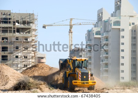 Bulldozer in the city building yard