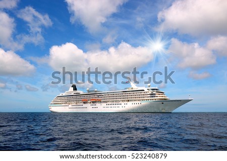 Big cruise liner in the open sea at sunny day