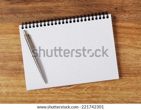 Notebook Blank notebook on wooden texture