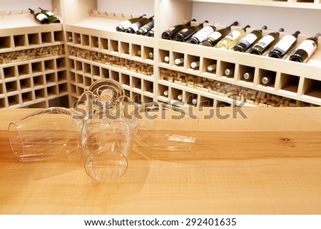 Empty wine glasses in wine rack