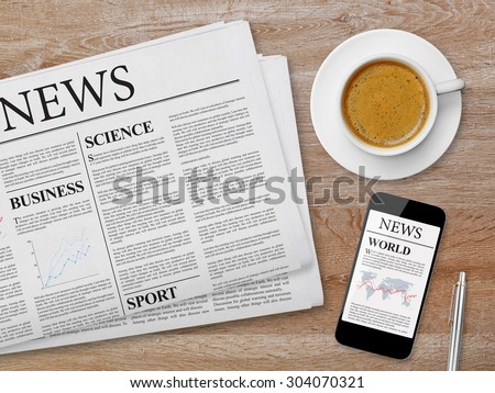 News page on tablet, newspaper and coffee