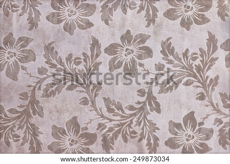 Fragment of tapestry pattern with floral background
