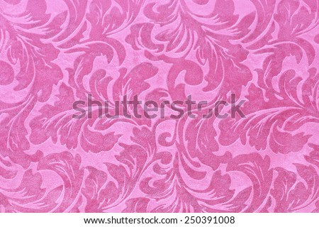 Fragment of tapestry pattern with pink floral background