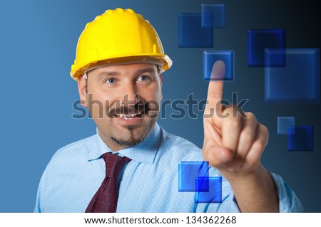 Man touches a push-button. Points out with the finger