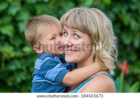 Son kissing his mom