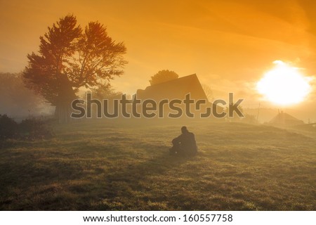 Foggy morning sunrise landscape in Transylvania