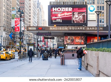 New York, circa dec 2014: People walk in front entrance of madison square garden in manhattan
