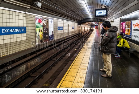 NY - MANHATTAN - 01 JAN 2015: Unidentified people waiting for the train at Exchange PL terminal in Manhattan