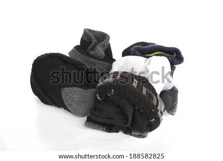 used dirty sock isolated on white background Stock Photo