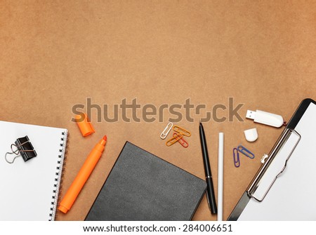 Still life, business, education concept. Office supplies, notepad, diary, marker, USB flash drive, pen and pencil on a table. Selective focus, copy space background, top view