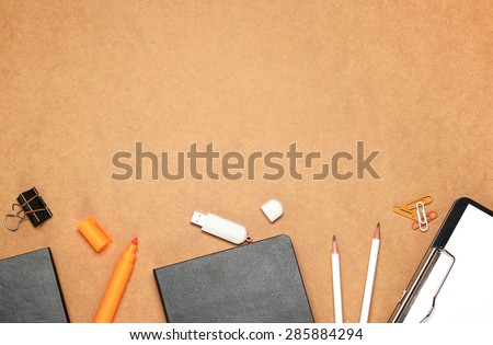Still life, business, education concept. Office supplies, notepad, diary, marker, USB flash drive and pencils on a table. Selective focus, copy space background, top view