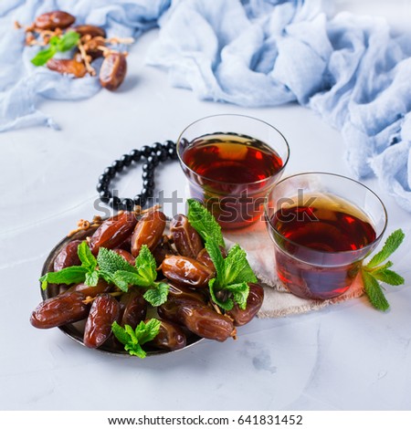 Ramadan ramazan kareem. Traditional arabic tea with mint and dates for iftar party holidays