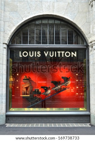 ZURICH, SWITZERLAND - DECEMBER 29, 2013 - Louis Vuitton shop, well known for its luxury trunks, leather goods, shoes, watches, jewelry and accessories