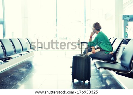 Girl At The Airport Window
