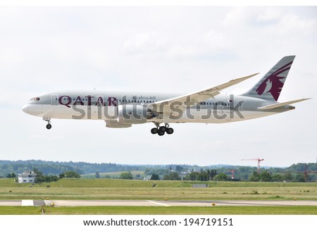 ZURICH, SWITZERLAND - MAY 25, 2014: Qatar airplane landing at Zurich international airport on May 25, 2014. Zurich International Airport is one of the major Europian Hubs.