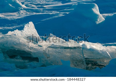 Ice breaking on an frozen lake