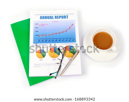 Top view of annual report on white background.