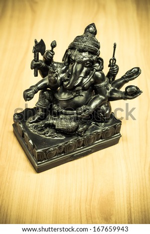 Ganesh elegant metal on wood floors.