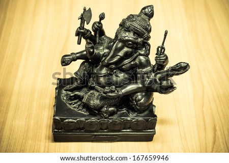 Ganesh elegant metal on wood floors.