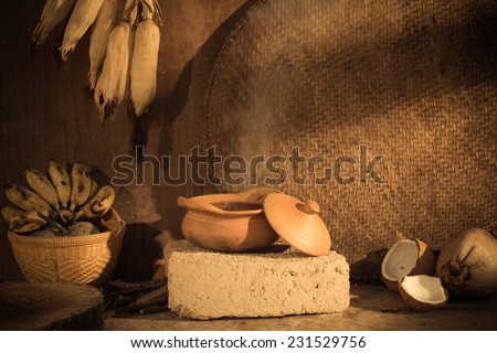 Still life with Kitchen Thailand ancient clay pots and stoves used as the main force.