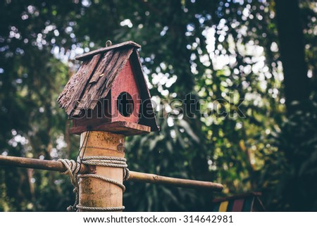 Bird house in the garden.Old wooden bird house.