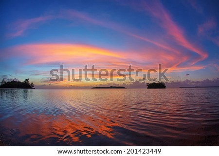 Light in motion over the Philippine Sea as the sun sets from Guam