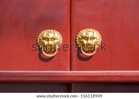 Ancient Chinese door knocker, located in Temple of Confucius, Harbin City, Heilongjiang Province, China.