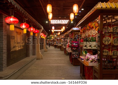 HARBIN, CHINA - OCTOBER 29: Ancient Chinese commercial street, located in the Ancient Alley of Northeast China. October 29, 2013 in Harbin City, Heilongjiang Province, China.