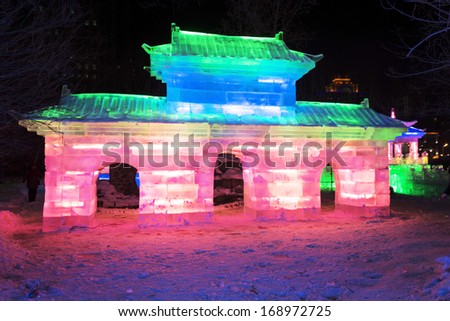 HARBIN, CHINA - DECEMBER 27, 2013: Ice building of Harbin Ice-Lantern Show. December 27, 2013 in Harbin City, Heilongjiang Province, China.
