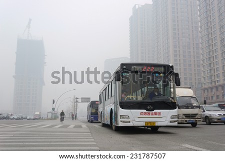 SHENYANG, CHINA - OCTOBER 31, 2014: City in a heavy hazy weather. The deterioration of air quality resulted in low horizontal visibility. Located in Shenyang City, Liaoning Province, China.