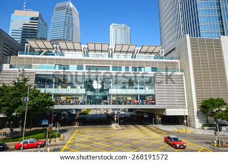 Hong Kong - February 13, 2015: Apple Retail Stores. Shoppers trying out Apple products and shopping. Located in International Finance Centre, Central, Hong Kong.