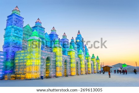 Harbin, China - January 6, 2015: Ice building in Harbin Ice and Snow World. People are visiting. Located in Harbin City, Heilongjiang Province, China.